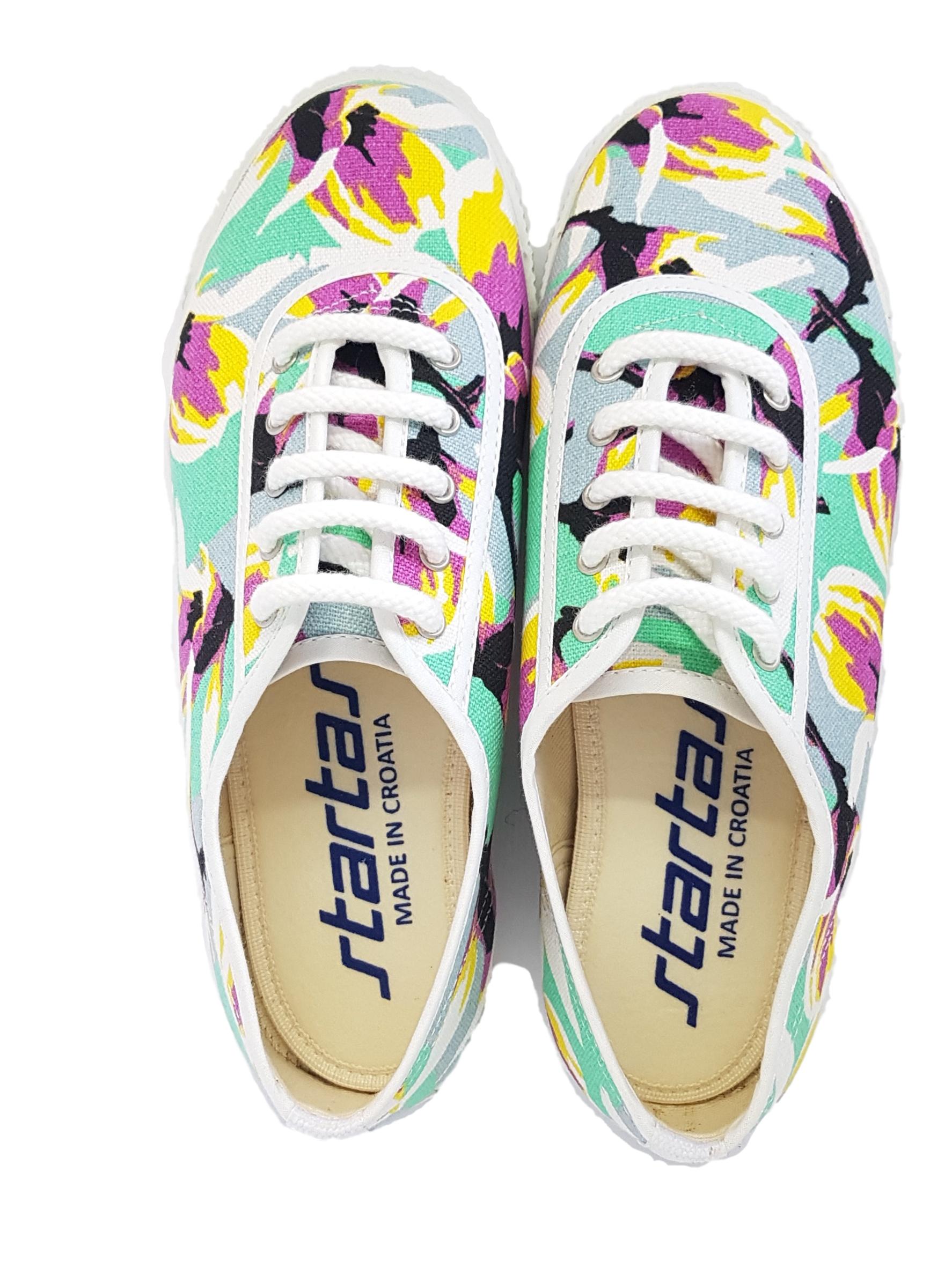 Colorful sneakers with floral pattern and 'startas' branding on a white background